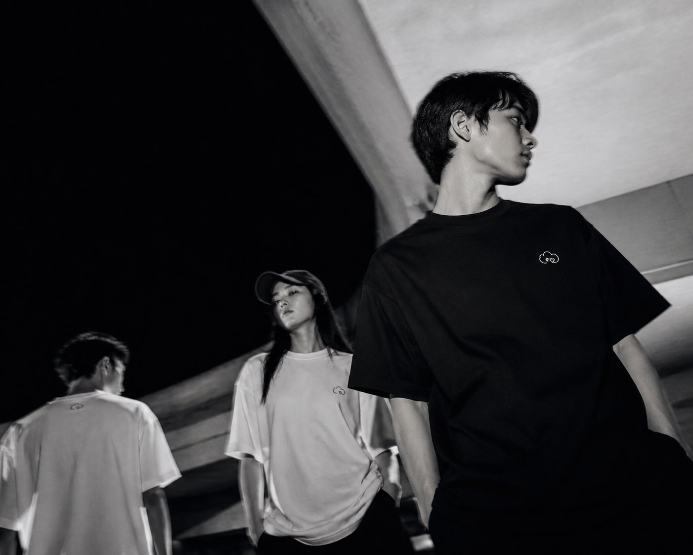 Mune Made Drop 001 — three models in monochrome oversized tees